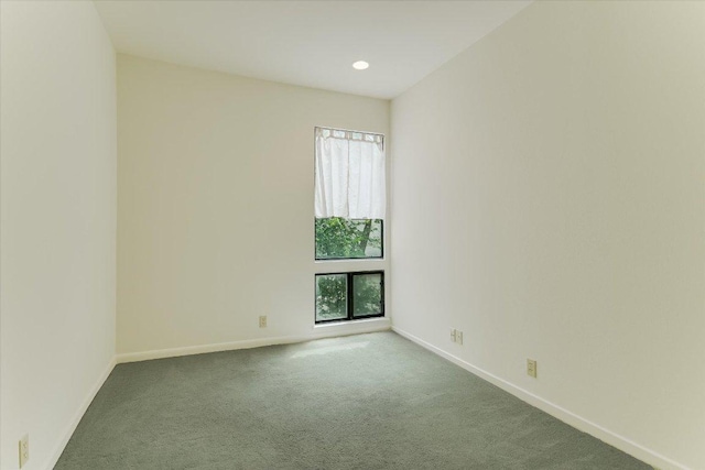 1707 Spyglass Dr Unit 41, Austin, TX 78746 - carpeted spare room with baseboards