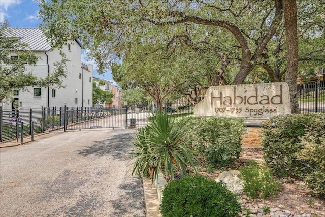 1707 Spyglass Dr Unit 41, Austin, TX 78746 - community sign with a residential view and a gate