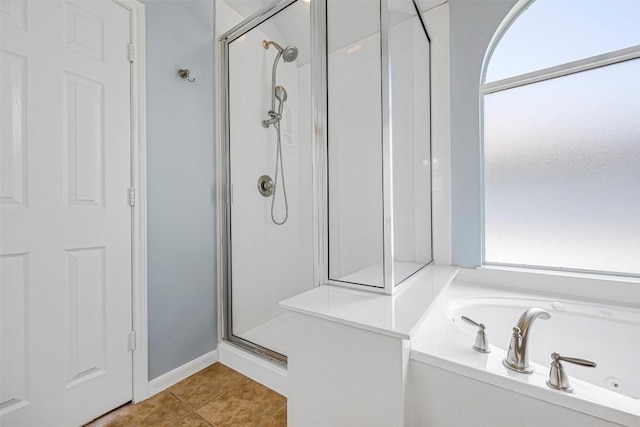 3126 Fiorellino Pl, Cedar Park, TX 78613 - bathroom featuring a stall shower, a garden tub, and tile patterned floors