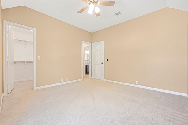 3126 Fiorellino Pl, Cedar Park, TX 78613 - unfurnished bedroom featuring lofted ceiling, light colored carpet, a spacious closet, a closet, and ceiling fan
