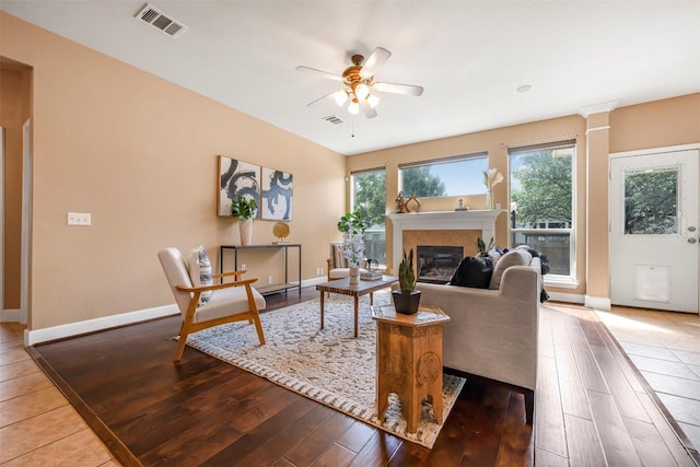 3126 Fiorellino Pl, Cedar Park, TX 78613 - living room featuring a ceiling fan, wood-type flooring, and a glass covered fireplace