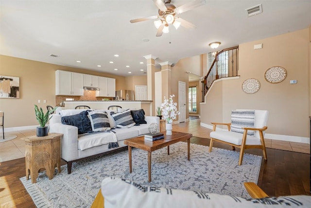 3126 Fiorellino Pl, Cedar Park, TX 78613 - living area with ceiling fan, wood finished floors, ornate columns, and recessed lighting