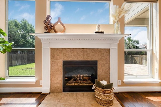 3126 Fiorellino Pl, Cedar Park, TX 78613 - detailed view of a tile fireplace and wood finished floors