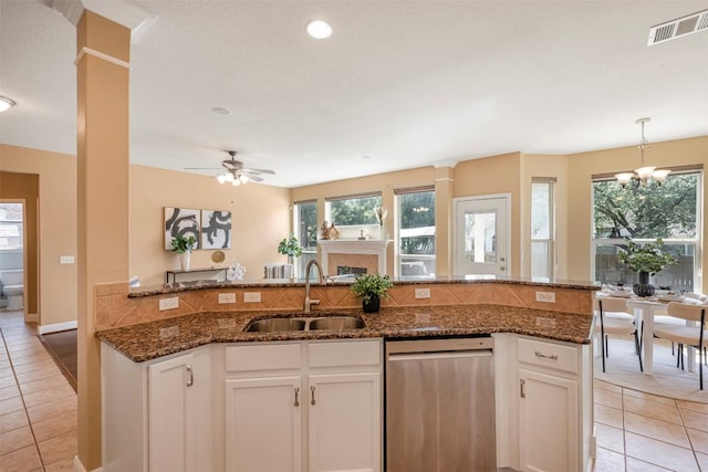 3126 Fiorellino Pl, Cedar Park, TX 78613 - kitchen with dishwasher, light tile patterned floors, healthy amount of natural light, and recessed lighting