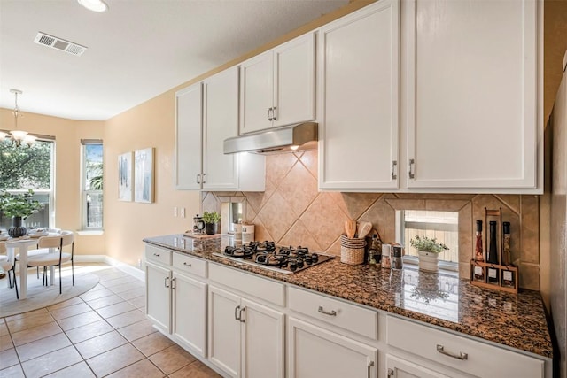 3126 Fiorellino Pl, Cedar Park, TX 78613 - kitchen featuring gas stovetop, backsplash, and white cabinetry
