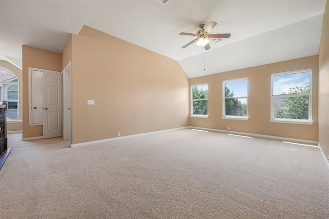 3126 Fiorellino Pl, Cedar Park, TX 78613 - spare room with a ceiling fan, light colored carpet, arched walkways, and lofted ceiling