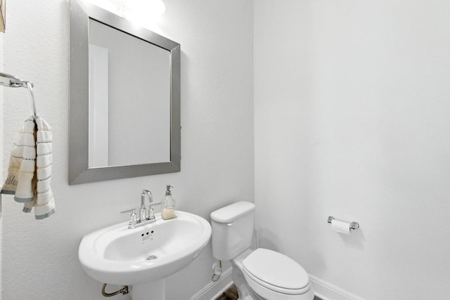 216 Tovas Secret Cv, Georgetown, TX 78628 - half bathroom with toilet and a sink