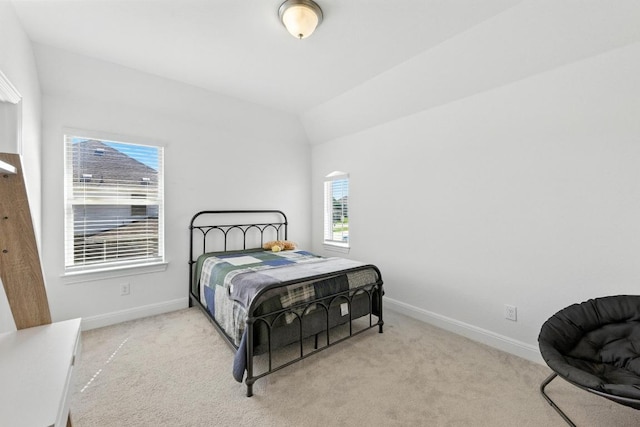 216 Tovas Secret Cv, Georgetown, TX 78628 - carpeted bedroom featuring baseboards and vaulted ceiling