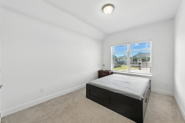 216 Tovas Secret Cv, Georgetown, TX 78628 - carpeted bedroom with baseboards and vaulted ceiling