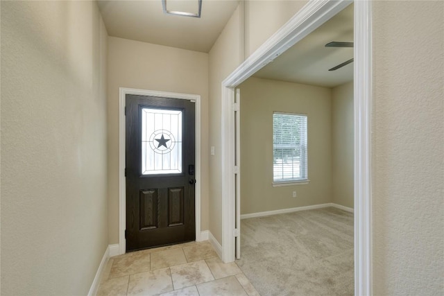 108 Tricia Ln, Hutto, TX 78634 - entrance foyer with light tile patterned floors and ceiling fan