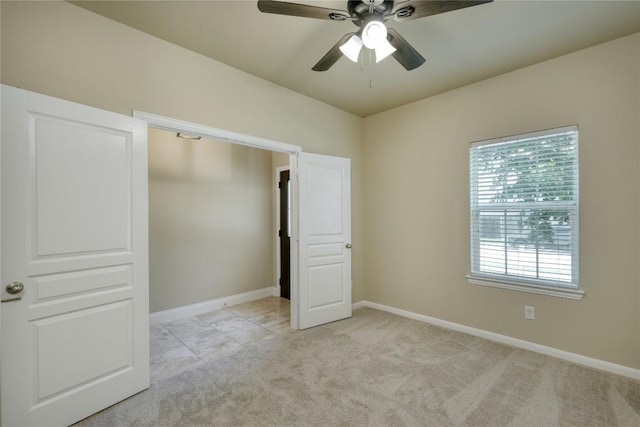 108 Tricia Ln, Hutto, TX 78634 - unfurnished bedroom with light carpet and ceiling fan