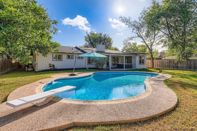 3013 Val Dr, Austin, TX 78723 - view of swimming pool with a fenced backyard and a diving board
