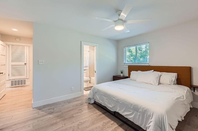 3013 Val Dr, Austin, TX 78723 - bedroom with light wood-style floors, ensuite bathroom, and ceiling fan