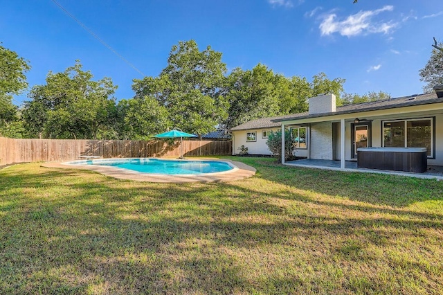 3013 Val Dr, Austin, TX 78723 - view of pool with a hot tub, a fenced backyard, and a patio