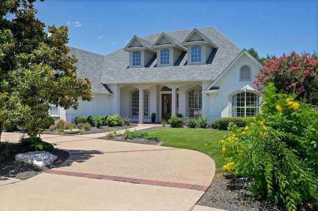 2314 Camino Del Verdes Pl, Round Rock, TX 78681 - view of front facade featuring a shingled roof and a front yard