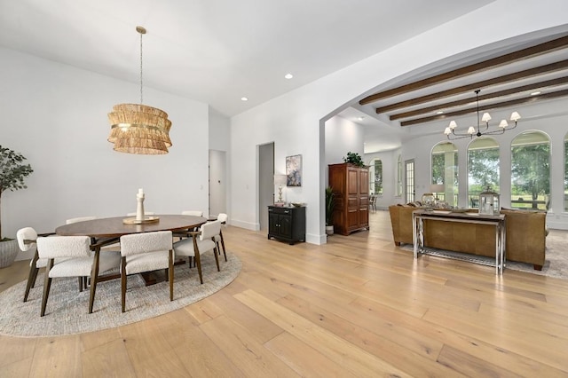 2314 Camino Del Verdes Pl, Round Rock, TX 78681 - dining space with a chandelier, light wood-style floors, beam ceiling, arched walkways, and recessed lighting