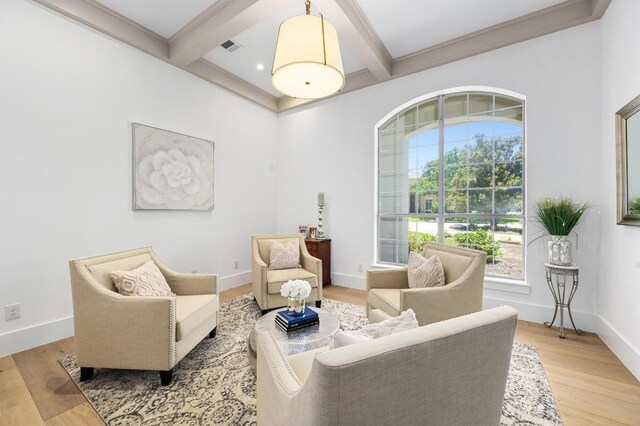 2314 Camino Del Verdes Pl, Round Rock, TX 78681 - sitting room with beam ceiling, coffered ceiling, and light wood-style floors