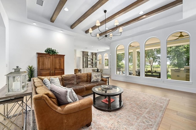 2314 Camino Del Verdes Pl, Round Rock, TX 78681 - living area featuring a chandelier, beam ceiling, recessed lighting, and light wood-style floors