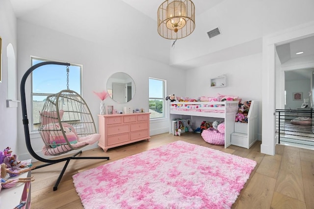 2314 Camino Del Verdes Pl, Round Rock, TX 78681 - bedroom with wood finished floors and vaulted ceiling