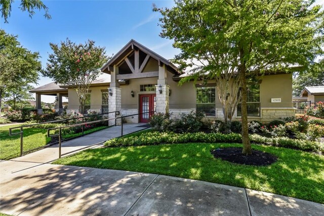 2314 Camino Del Verdes Pl, Round Rock, TX 78681 - view of front of house with stucco siding, stone siding, and french doors