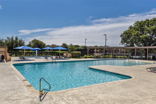 2314 Camino Del Verdes Pl, Round Rock, TX 78681 - community pool featuring a patio