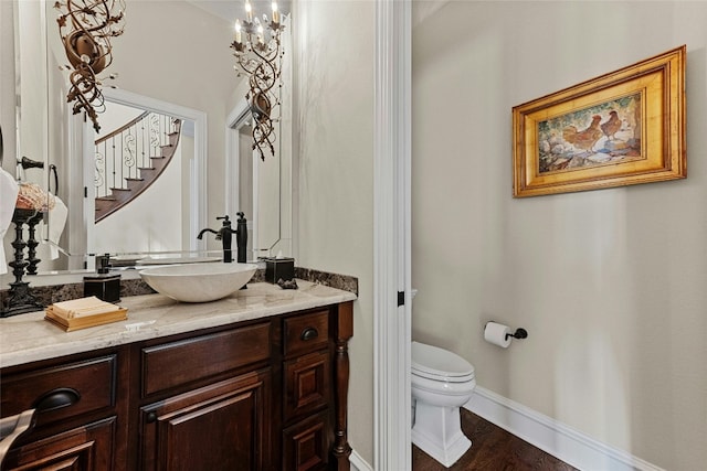 604 Flamingo Cv, Lakeway, TX 78734 - bathroom featuring vanity and wood finished floors