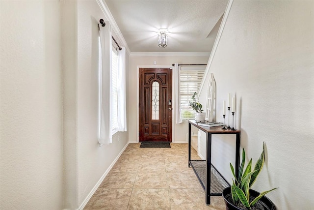 140 Housefinch Loop, Leander, TX 78641 - foyer entrance with ornamental molding and light tile patterned flooring