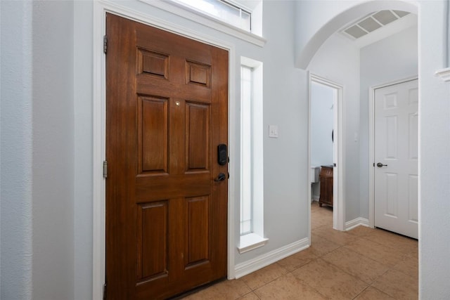 3443 Cortes Pl, Round Rock, TX 78665 - entryway with arched walkways and light tile patterned flooring