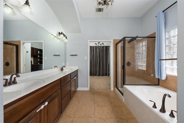 3443 Cortes Pl, Round Rock, TX 78665 - bathroom featuring plenty of natural light, a bath, a shower stall, and double vanity