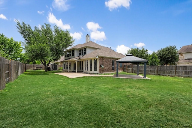 3443 Cortes Pl, Round Rock, TX 78665 - rear view of property with a gazebo, a patio area, a chimney, and a fenced backyard