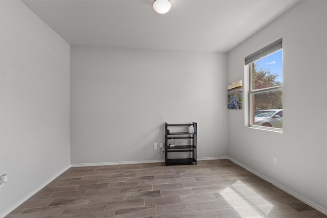 11717 Reindeer Dr, Austin, TX 78754 - unfurnished room with baseboards and wood finished floors