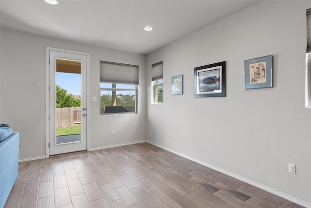 11717 Reindeer Dr, Austin, TX 78754 - spare room with wood finished floors and recessed lighting