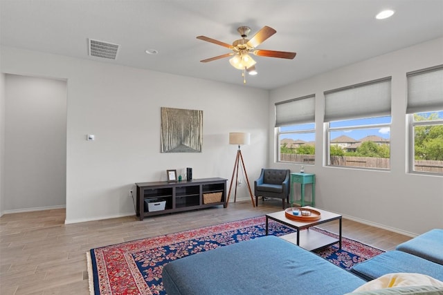 11717 Reindeer Dr, Austin, TX 78754 - living room featuring a ceiling fan, wood finished floors, and recessed lighting