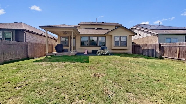 11717 Reindeer Dr, Austin, TX 78754 - rear view of house featuring a ceiling fan and a fenced backyard