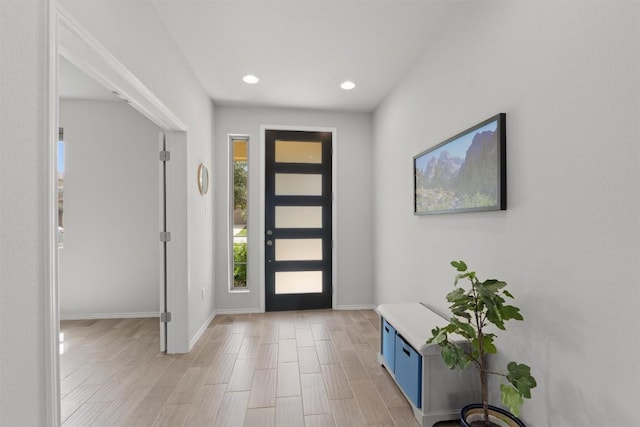 11717 Reindeer Dr, Austin, TX 78754 - entryway with recessed lighting and light wood-style floors
