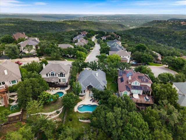 12464 Fairfax Ridge Pl, Austin, TX 78738 - aerial view of property and surrounding area featuring nearby suburban area and a pool area