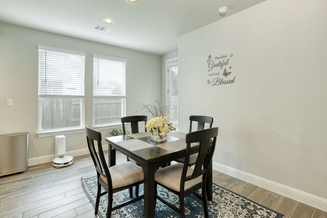 217 Stone Creek Dr, Georgetown, TX 78628 - dining room featuring wood finished floors and recessed lighting