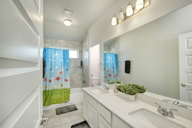 217 Stone Creek Dr, Georgetown, TX 78628 - bathroom with shower / bath combo, double vanity, and tile patterned floors