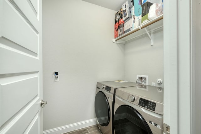 217 Stone Creek Dr, Georgetown, TX 78628 - laundry room featuring washing machine and dryer and wood finished floors