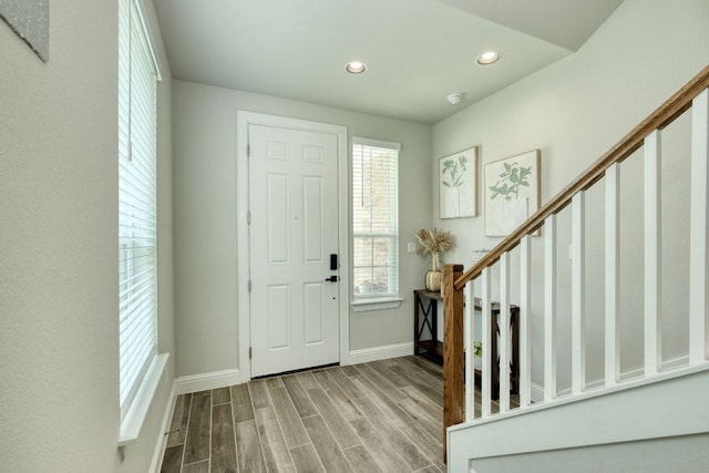 217 Stone Creek Dr, Georgetown, TX 78628 - entryway featuring stairs, wood finished floors, and recessed lighting