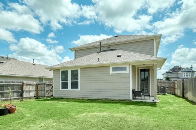 217 Stone Creek Dr, Georgetown, TX 78628 - back of house featuring a fenced backyard and a shingled roof