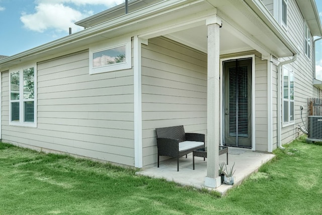 217 Stone Creek Dr, Georgetown, TX 78628 - view of home's exterior with a lawn and a patio area