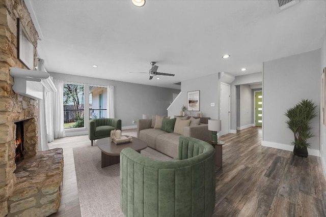 4904 Wing Rd, Austin, TX 78749 - living area featuring a fireplace, wood finished floors, a ceiling fan, and recessed lighting