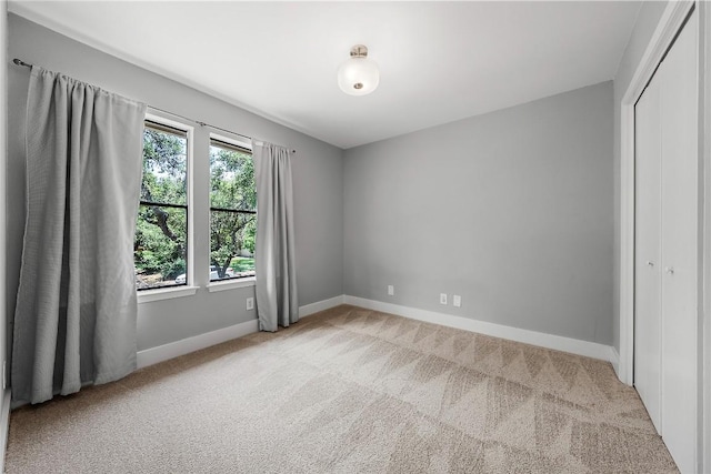 4904 Wing Rd, Austin, TX 78749 - empty room with light colored carpet and baseboards