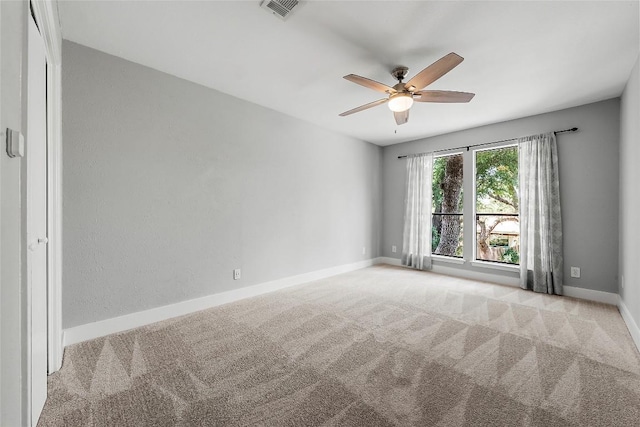 4904 Wing Rd, Austin, TX 78749 - carpeted empty room with a ceiling fan and baseboards