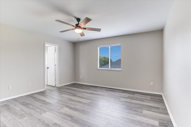 1000 Warbler Cv, Hutto, TX 78634 - spare room featuring ceiling fan and wood finished floors