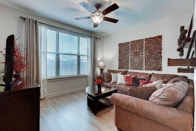 1201 Grove Blvd Unit 1404, Austin, TX 78741 - living room featuring light wood-type flooring and ceiling fan