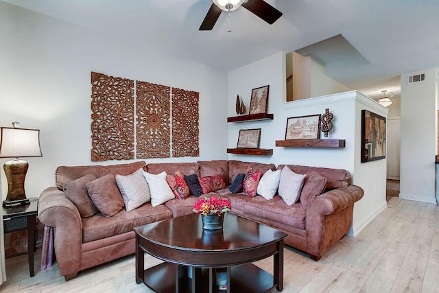 1201 Grove Blvd Unit 1404, Austin, TX 78741 - living room featuring ceiling fan and light wood-style flooring