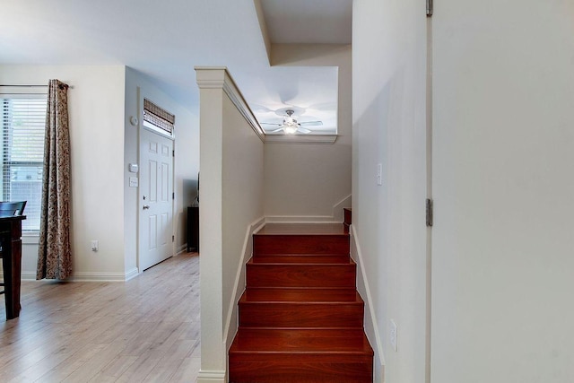 1201 Grove Blvd Unit 1404, Austin, TX 78741 - stairs with ceiling fan and wood finished floors