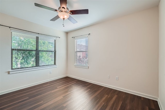 1201 Grove Blvd Unit 1404, Austin, TX 78741 - spare room with dark wood-style flooring and a ceiling fan